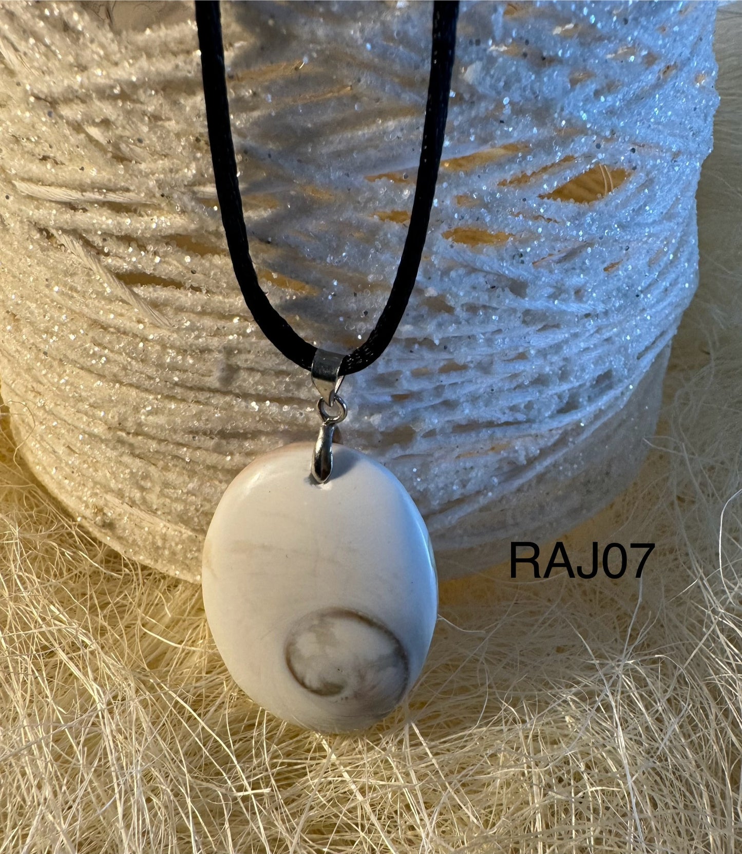 Pendentif œil de Sainte Lucie